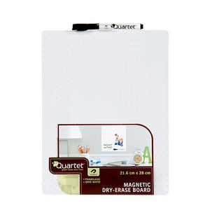 Quartet grid tile covered in small grey dots, a black and white Quartet marker across the top edge and a brown Quartet pack label with a desk scene and the words Grid White and Frameless