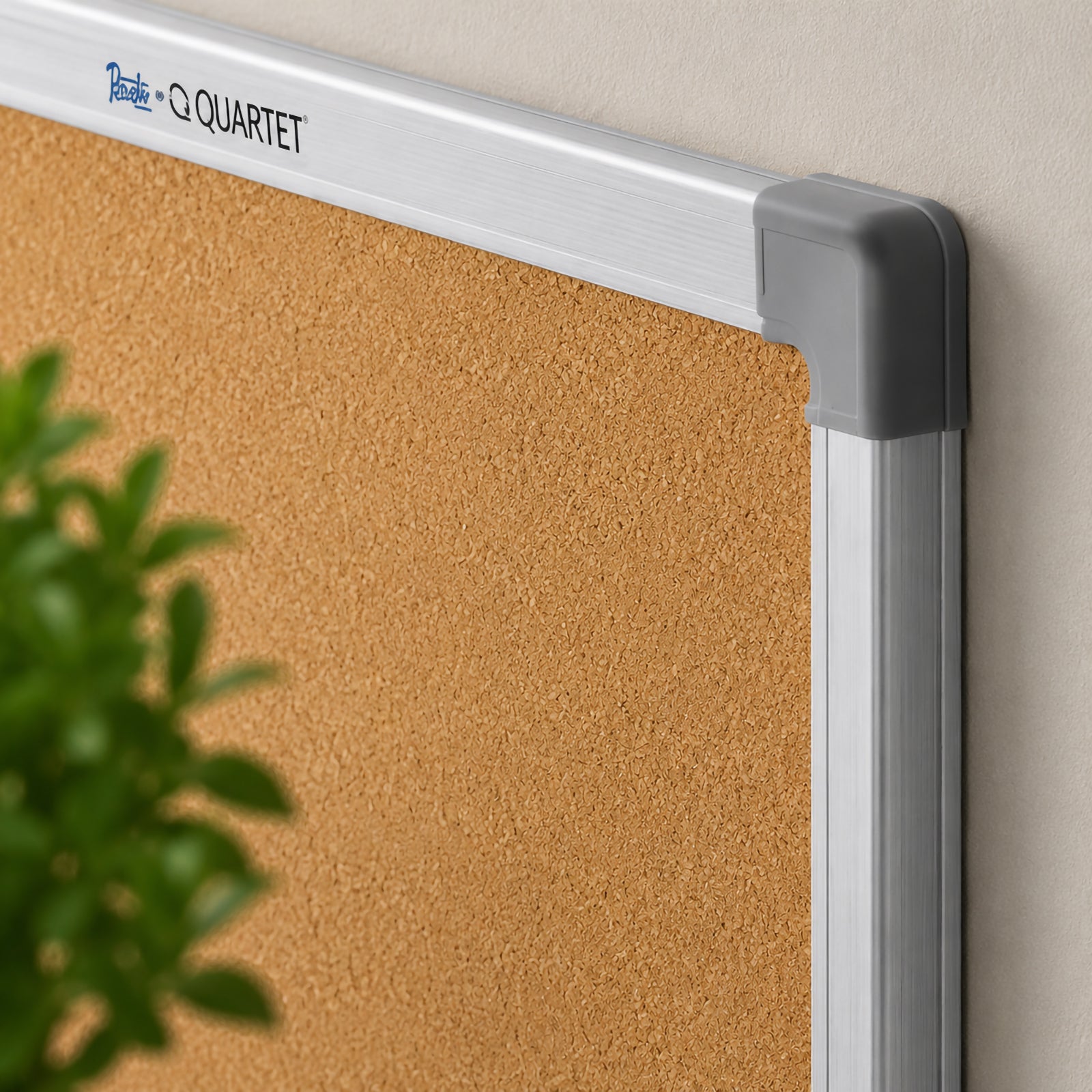 Close up of the Quartet Corkboard Aluminium Frame 900 x 600mm highlighting the premium self healing cork surface, durable aluminium frame and reinforced corner protectors. The detailed view showcases the board's quality construction for long lasting office and classroom use.