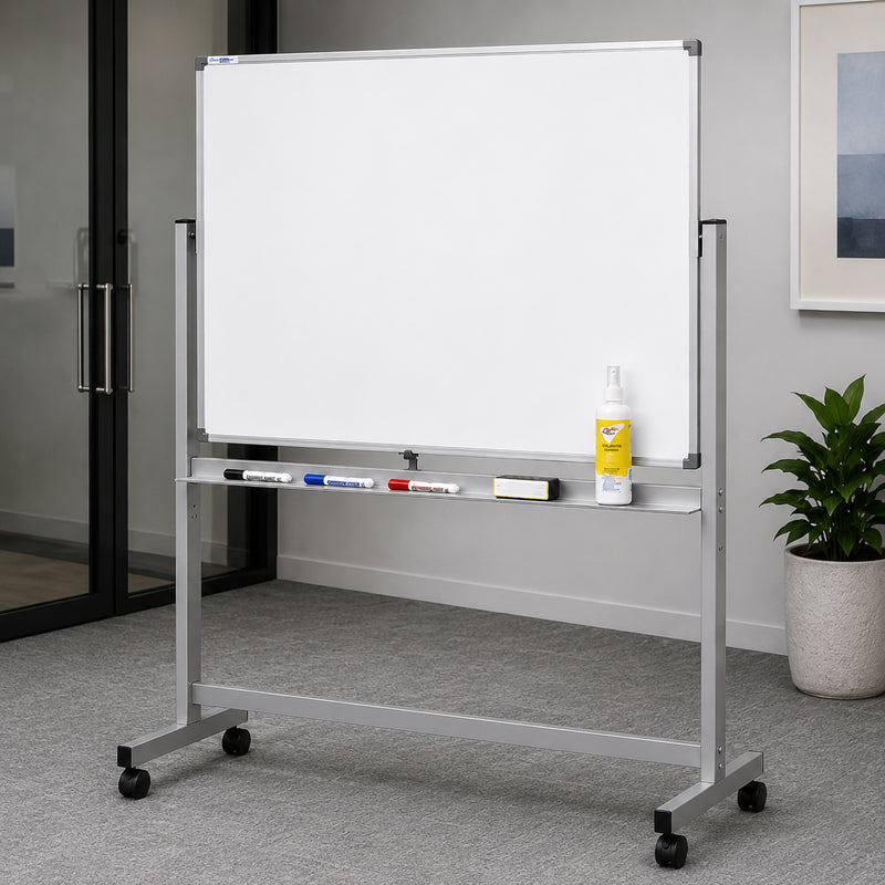 The Quartet Penrite Magnetic Porcelain Mobile Whiteboard 1200 x 900mm positioned in a contemporary office setting with a clean blank writing surface ready for presentations and brainstorming. The robust aluminium frame, integrated marker tray and lockable castors emphasise its mobility, durability and professional appearance.