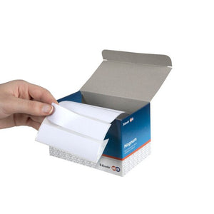 Hand drawing a long white 89 x 24mm label from the open flap of a QuikStik Magnum roll address label box