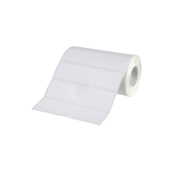 Roll of long white QuikStik Magnum labels partly unwound, showing the perforations between labels