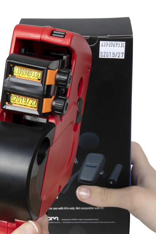 QuikStik Mark II Date Price Gun shown alongside included white permanent label rolls ready for immediate use in date coding and batch marking operations