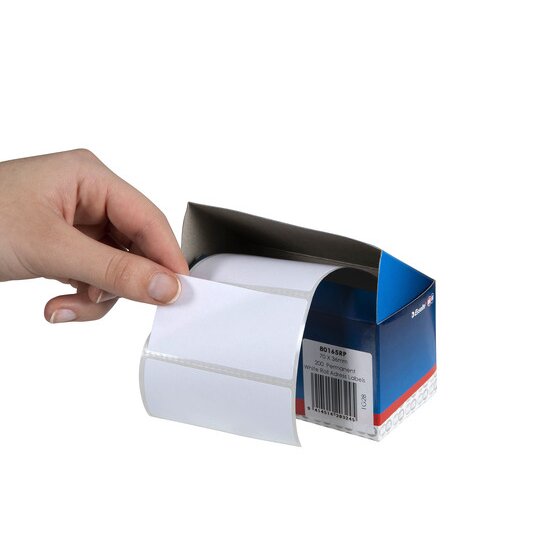 Hand pulling a white 70 x 36mm address label from the open top of a QuikStik roll address labels box