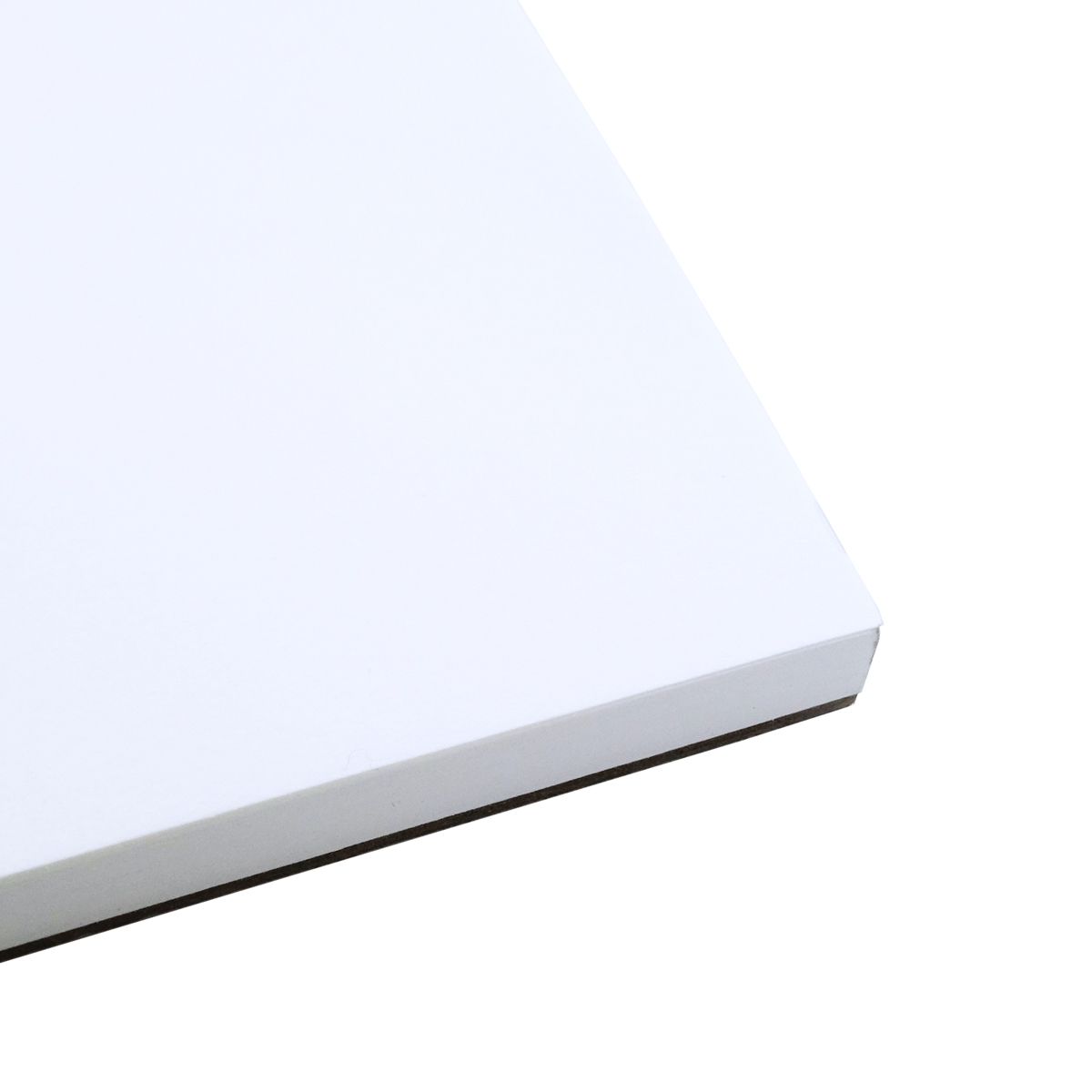 Close view of a corner of the Quill Sketch Pad A3 showing the stacked white cartridge leaves resting on the backing board