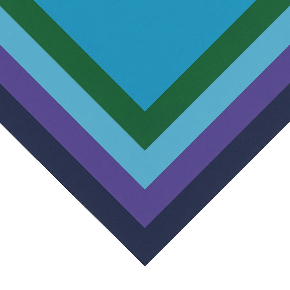 Quill A5 cold assorted coloured paper out of the pack, violet, marine blue, emerald, sky blue and royal blue sheets fanned