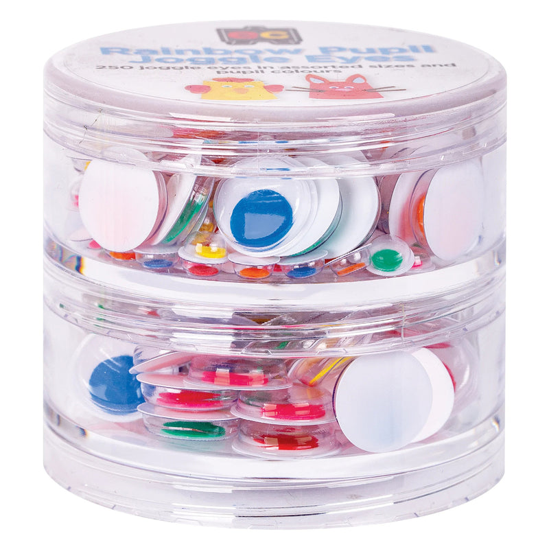Close up view of the Educational Colours Rainbow Pupil Joggle Eyes storage container filled with assorted eye sizes and colourful pupils. The transparent case provides convenient visibility and organisation.