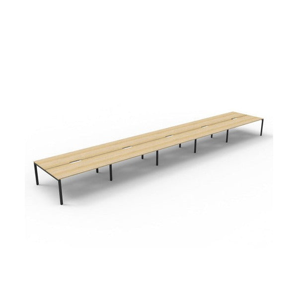 Rapidline Deluxe Infinity back to back profile leg workstation with Natural Oak top and Black Satin base, wide angled studio view without screens