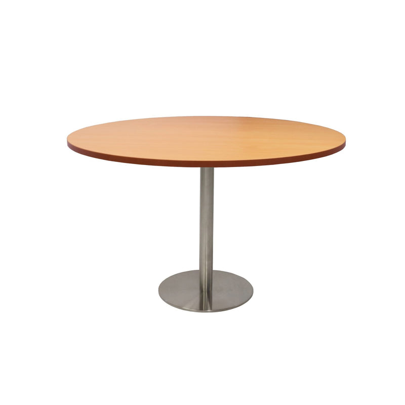 Front elevation of the Rapidline Estilo 1200mm round table in beech with a stainless steel column and flat disc base on a white background
