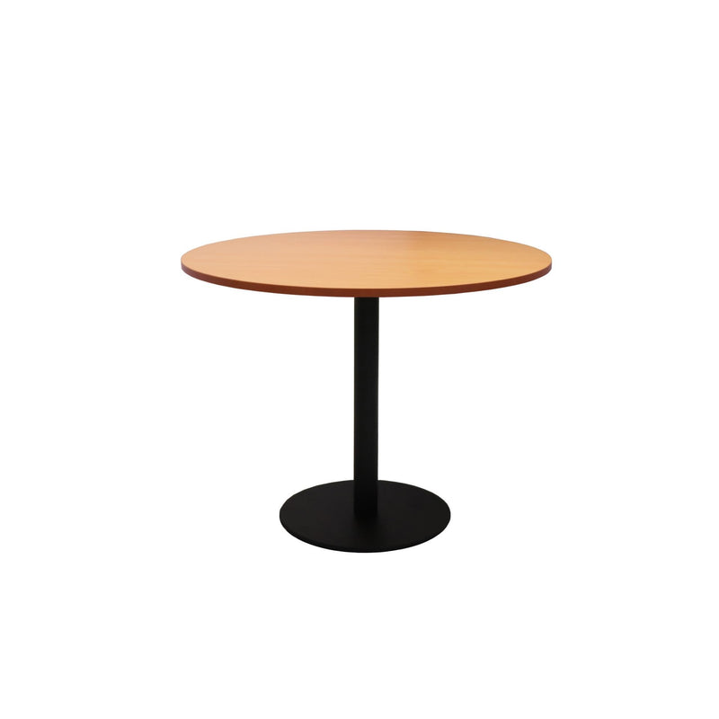 Front elevation of the Rapidline Estilo 900mm round table in beech with a black column and flat disc base on a white background