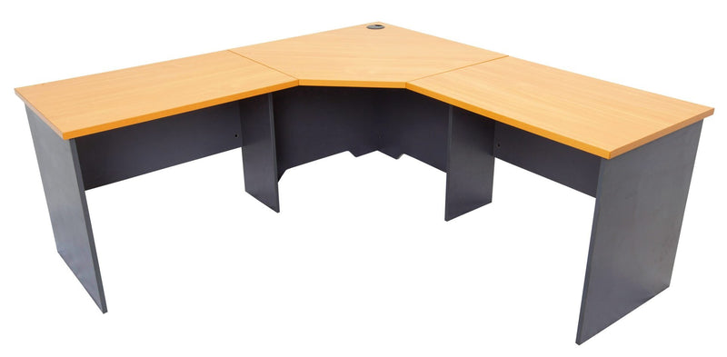 Rapidline photo of the Rapid Worker corner workstation in beech and ironstone, showing the three piece worktop and panel end legs.