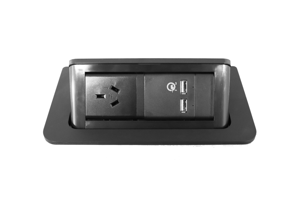 Rapidline pop-up in desk power module in black, front view of the raised module showing the GPO and two USB-A ports