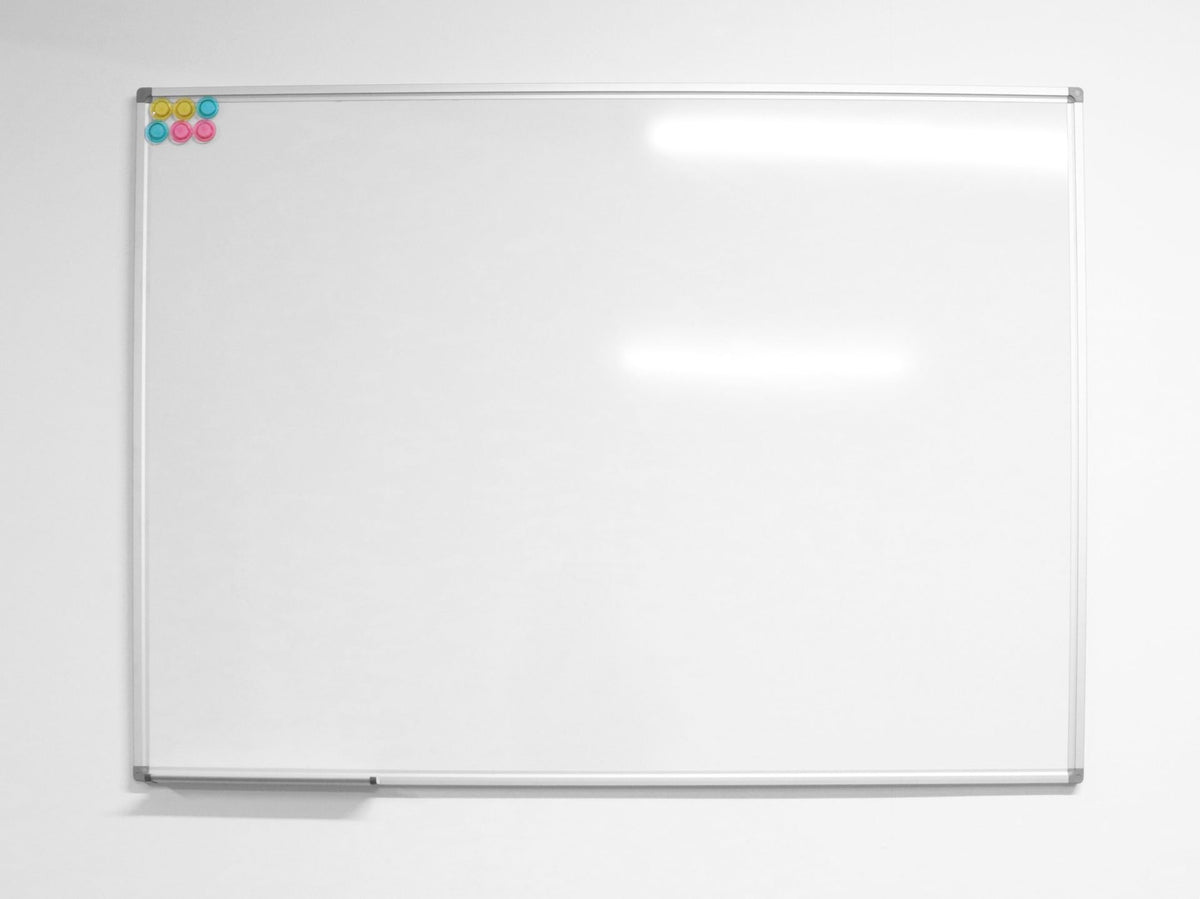 Rapidline Standard Whiteboard range, front view of the white writing surface with a silver aluminium frame, grey corner caps and a pen tray along the bottom edge.