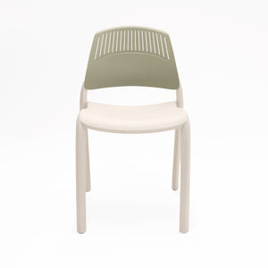 Rapidline Flexi high back stacking chair with a white seat and legs and a soft olive green slotted backrest, front three quarter view on a plain background.
