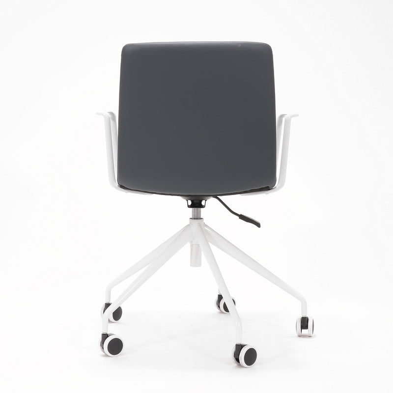 Rapidline Pixel 5 Star meeting chair with arms in French Navy PU on a white powdercoated five star swivel base with a gas strut and two loop arm rests, product photograph on a plain background showing the ribbed horizontal stitching across the seat and back.