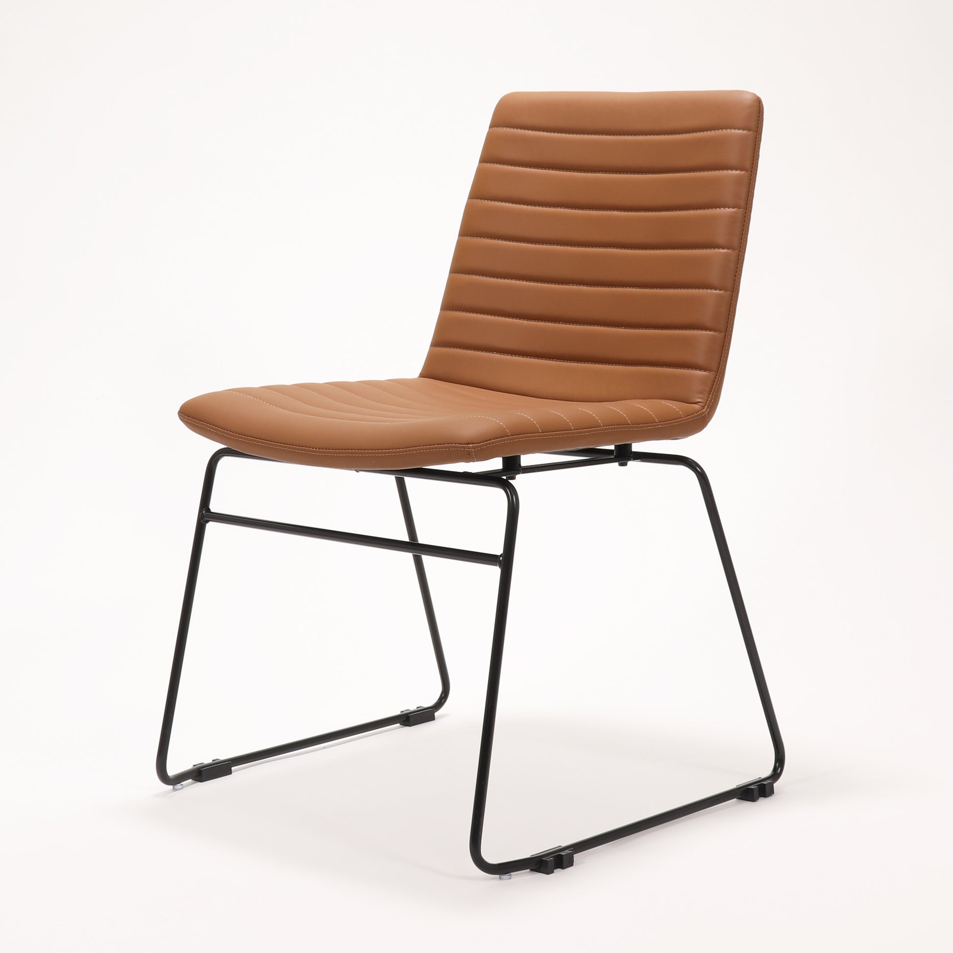Rapidline Pixel sled base visitor chair in amber PU on a black powdercoated continuous sled base, product photograph on a plain background showing the ribbed horizontal stitching across the seat and back.