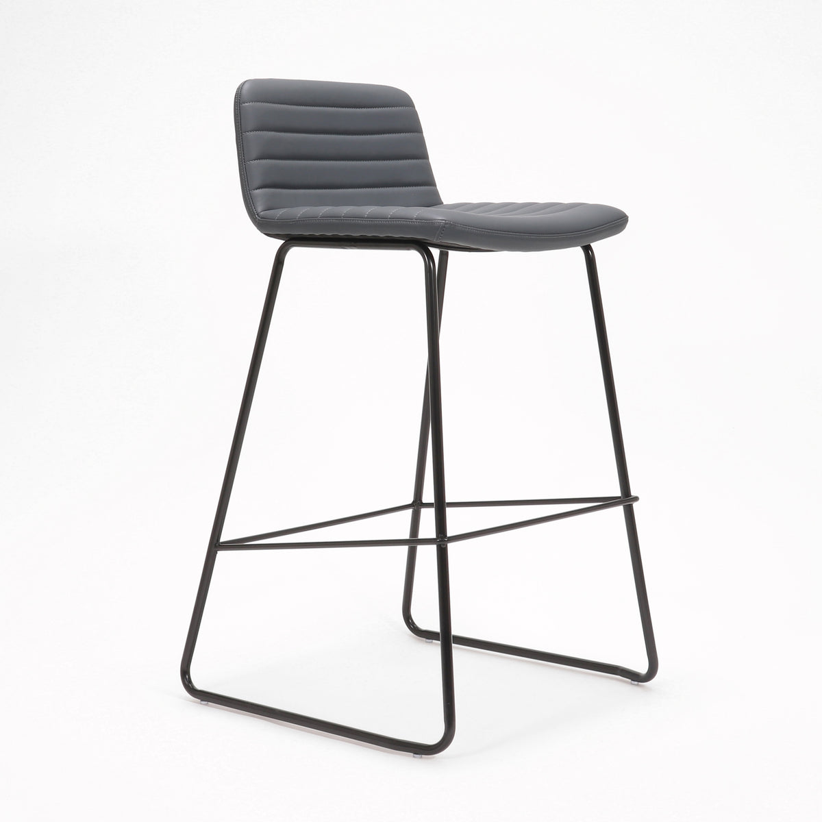 Rapidline Pixel bar high stool in French Navy PU on a black powdercoated tall sled base with a foot rail, product photograph on a plain background showing the ribbed horizontal stitching across the seat and back.
