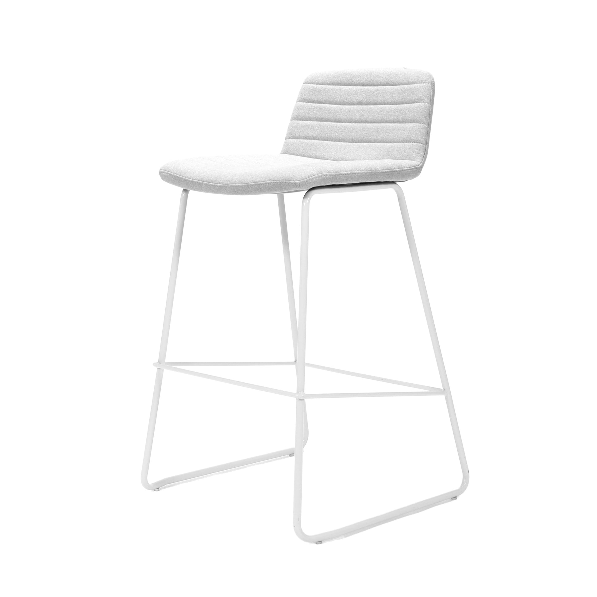 Rapidline Pixel bar high stool in light grey commercial fabric on a white powdercoated tall sled base with a foot rail, product photograph on a plain background showing the ribbed horizontal stitching across the seat and back.