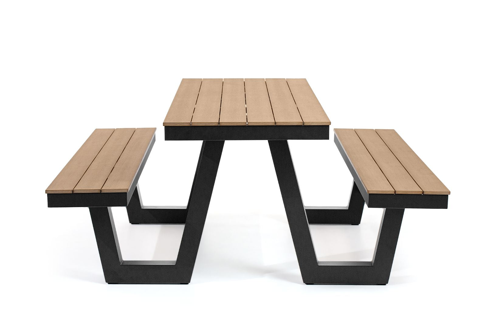 Rapidline Ridge picnic setting photographed outdoors on grass, showing the integrated table and two bench seats and the open span under the A frame legs.