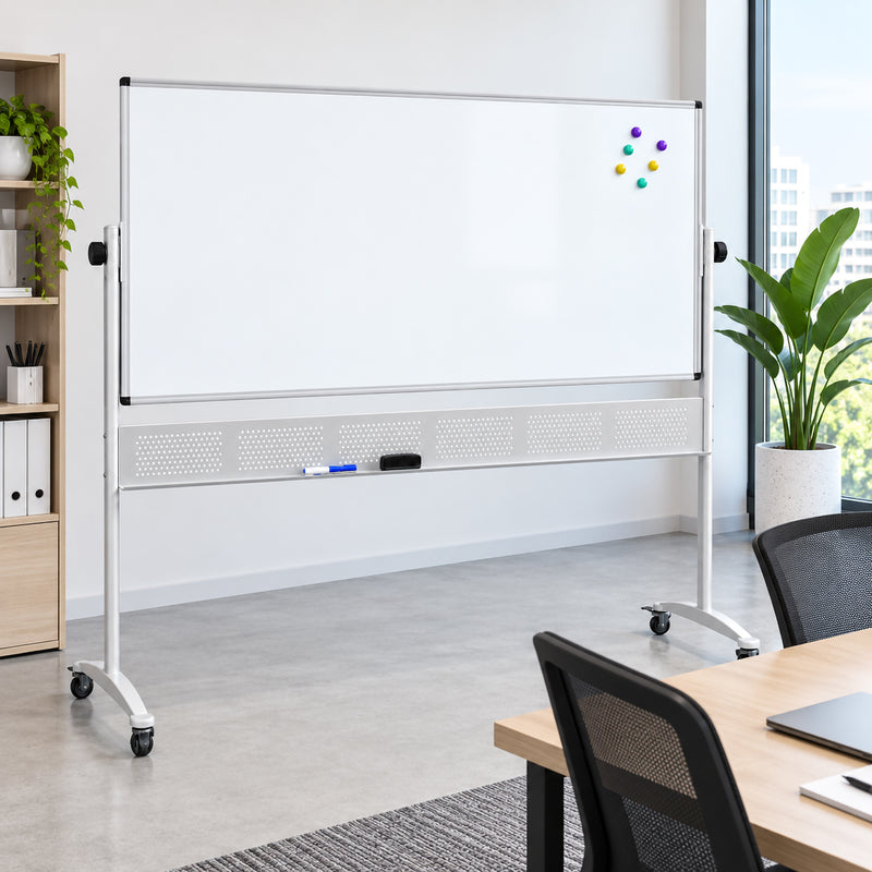 Rapidline Standard Mobile Magnetic Whiteboard 1800 x 900mm positioned in a bright contemporary office without a person. The wide magnetic board provides a clean presentation surface with colourful magnets displayed in one corner. The aluminium frame, pivot controls, mobile stand, pen tray and castors demonstrate a flexible solution for collaborative workplace communication.
