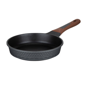 Resto Capella 24cm frypan from a three-quarter angle, showing the grey 3D-textured exterior, black non-stick interior and wood-grain handle