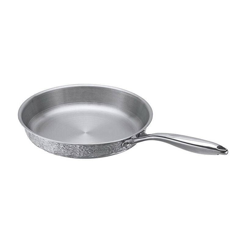 Angled view of the Resto Crater 24cm frypan showing the brushed, starburst-finished stainless steel interior and textured outer wall