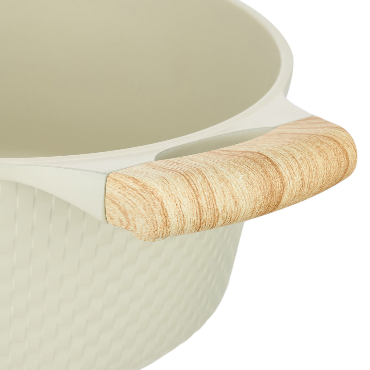 Close-up of one of the two wood-grain-effect soft-touch side handles on the beige Resto Ran casserole