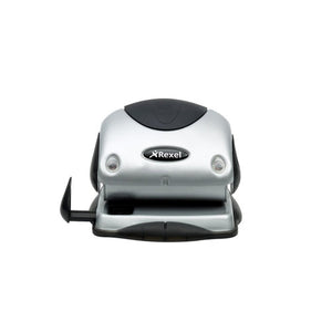 Rexel P215 two hole punch in silver and black, front view with the oval Rexel badge, two round chrome studs on the front face and the paper guide pulled out to the left