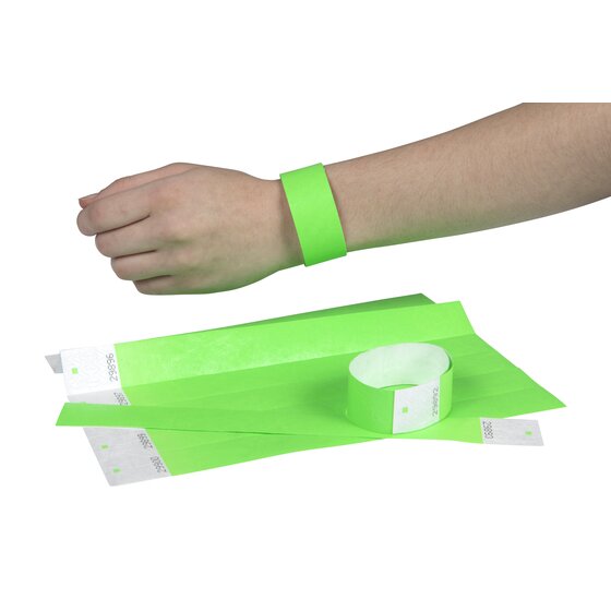 Fluoro green Rexel wristband fastened on a wrist, above a sheet of numbered green bands and one band closed into a loop
