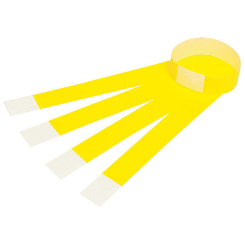 Four fluoro yellow Rexel serial number wristbands laid in a fan, one formed into a closed loop with its white tab showing