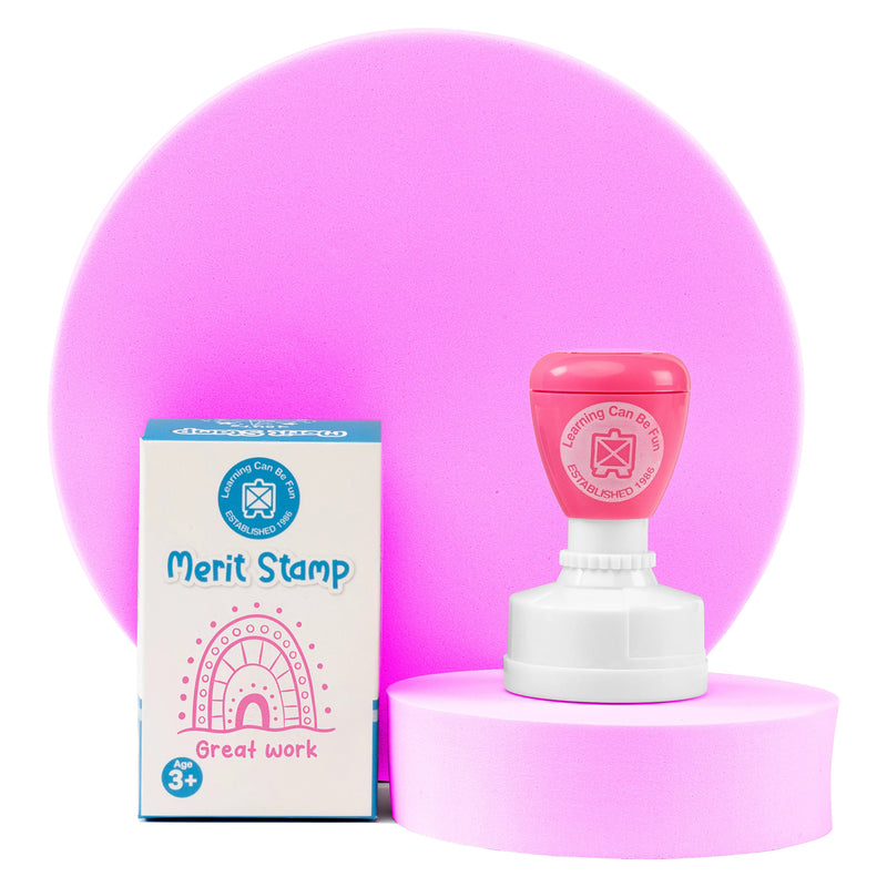 The stamp and retail packaging are displayed on a presentation stand against a soft pink backdrop. The image emphasises the product's vibrant appearance, quality construction and connection to the Sacred Country collection by Holly Sanders.