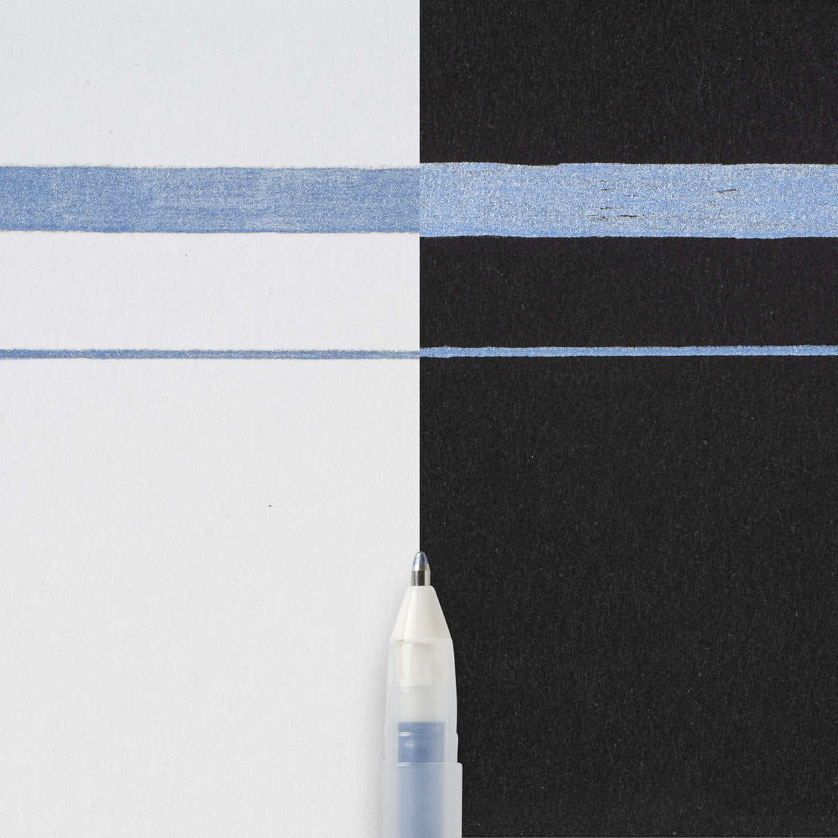 Sakura Gelly Roll Metallic Blue Black writing sample: thick and thin metallic lines across white and black paper with the pen tip below