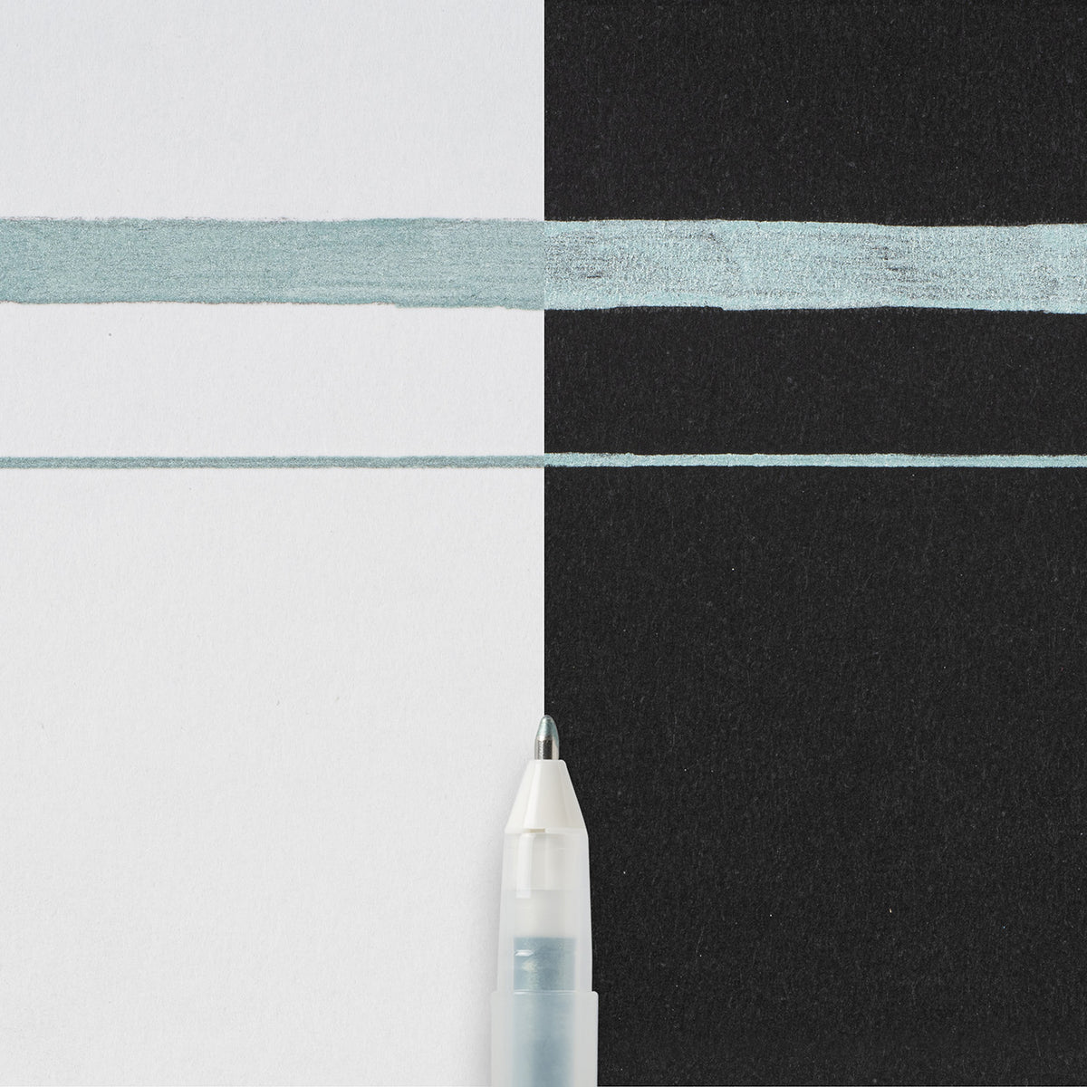 Sakura Gelly Roll Metallic Hunter Green writing sample: thick and thin metallic lines across white and black paper with the pen tip below