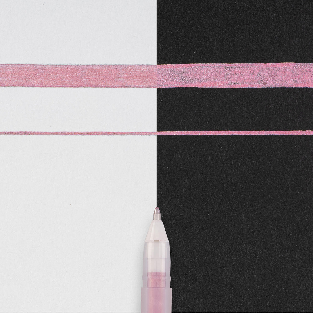 Sakura Gelly Roll Metallic Red writing sample: thick and thin metallic lines across white and black paper with the pen tip below