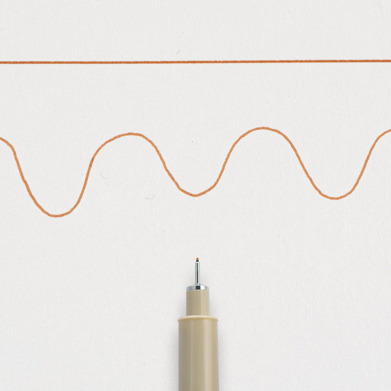 Sakura Pigma Micron 01 Brown: needle tip below a straight and a wavy 0.25mm test line drawn on white paper