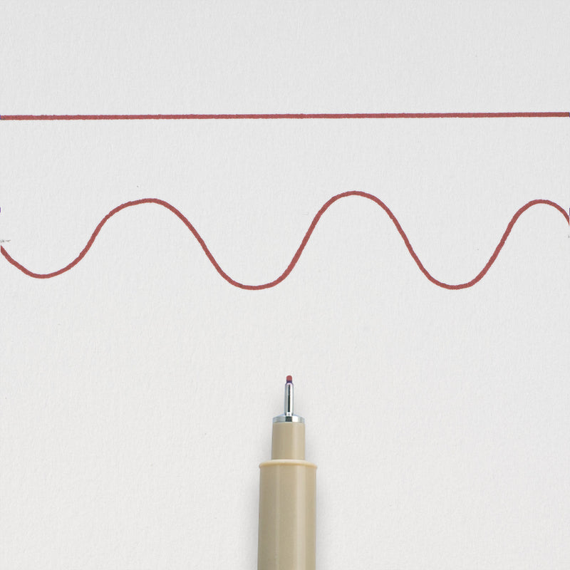 Sakura Pigma Micron 05 Burgundy: needle tip below a straight and a wavy 0.45mm test line drawn on white paper