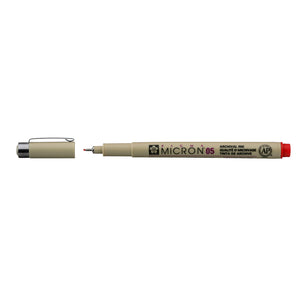 Sakura Pigma Micron 05 Red pen: uncapped side view with grey barrel printed Micron 05, cap with clip beside it