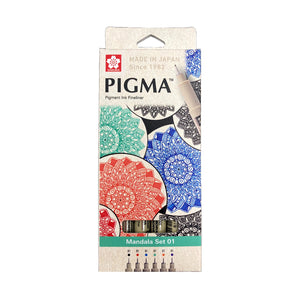 Sakura Pigma Mandala Set 01: front of hanging box with overlapping coloured mandala illustration and pens visible through the window