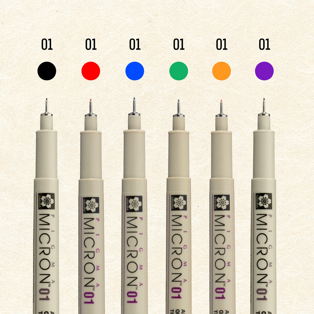 Sakura Pigma Mandala Set 01: six Micron 01 pens under black, red, blue, green, orange and purple colour dots