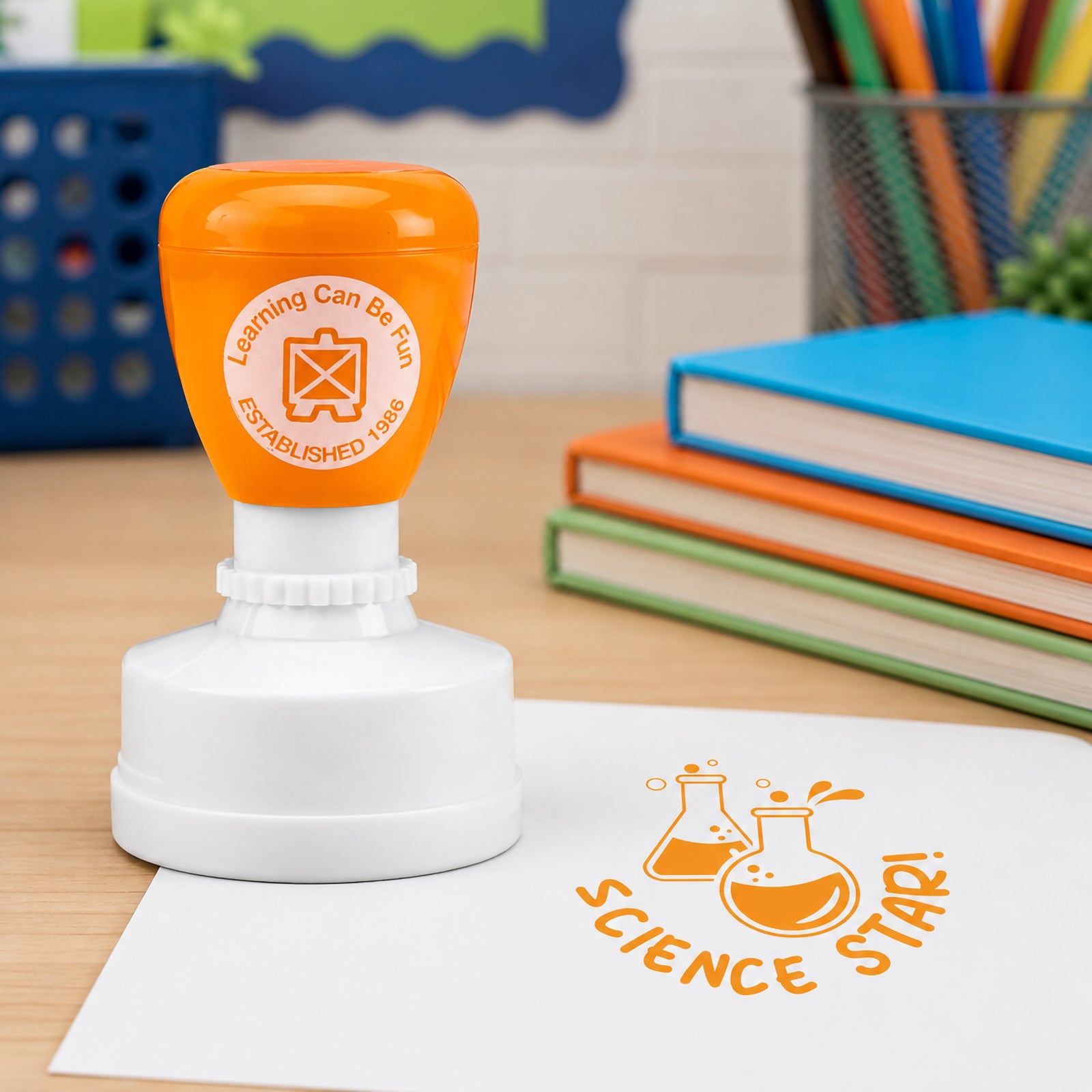 Classroom scene featuring the Science Star reward stamp with books and educational materials in the background. The science themed design celebrates discovery and encourages students to participate confidently in science and STEM activities.