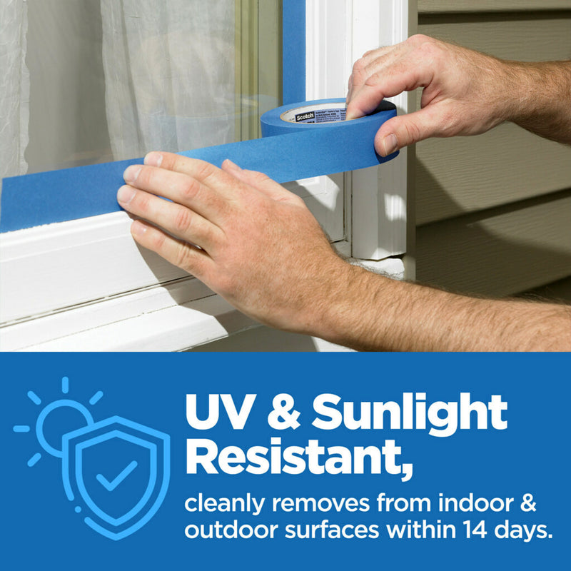 Hands pressing a strip of blue ScotchBlue painter's tape along a window frame, above a banner reading UV and sunlight resistant, cleanly removes from indoor and outdoor surfaces within 14 days.