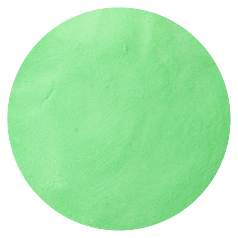 Close up view of soft textured green sensory cotton sand showing the smooth mouldable consistency ideal for tactile sensory play and creative learning activities.