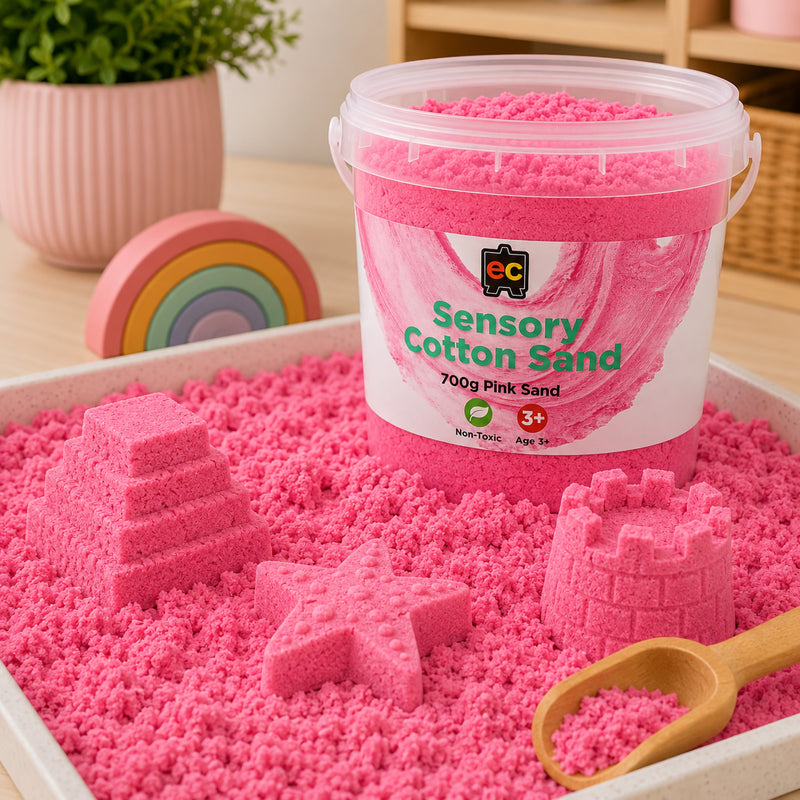 Educational Colours Sensory Cotton Sand 700g Pink displayed with shaped sensory creations in a play tray designed for tactile learning activities.