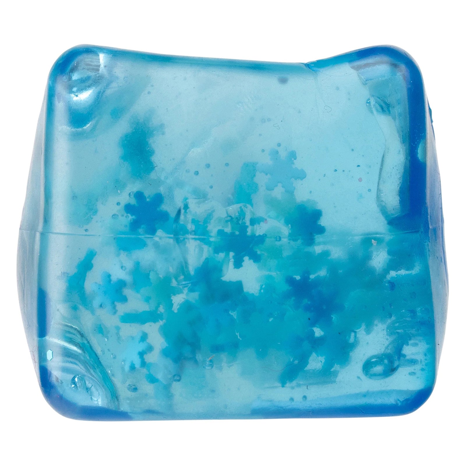 Detailed close up image of the blue jelly cube featuring floating snowflake pieces suspended inside the soft sensory material.