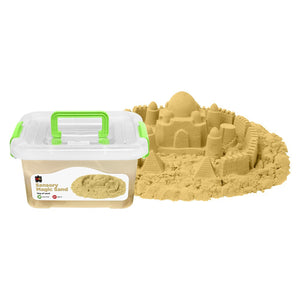 Educational Colours Sensory Magic Sand 5kg Natural displayed in a reusable storage container beside a detailed natural coloured sand castle creation showing the mouldable texture and creative sensory play possibilities for classrooms and home learning.