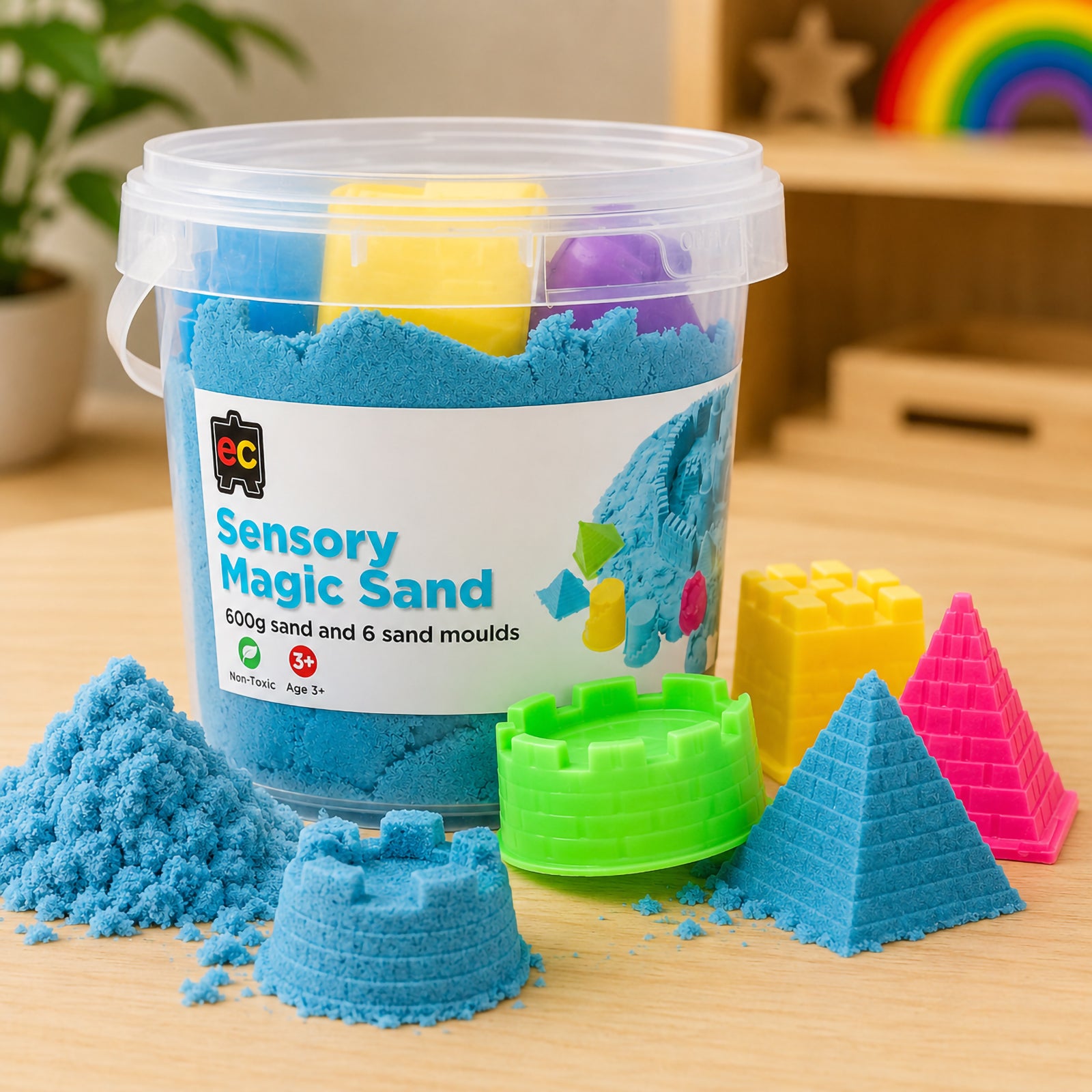Educational Colours Sensory Magic Sand with Moulds 600g Blue displayed with reusable storage tub, bright mould accessories, and detailed blue sand creations.