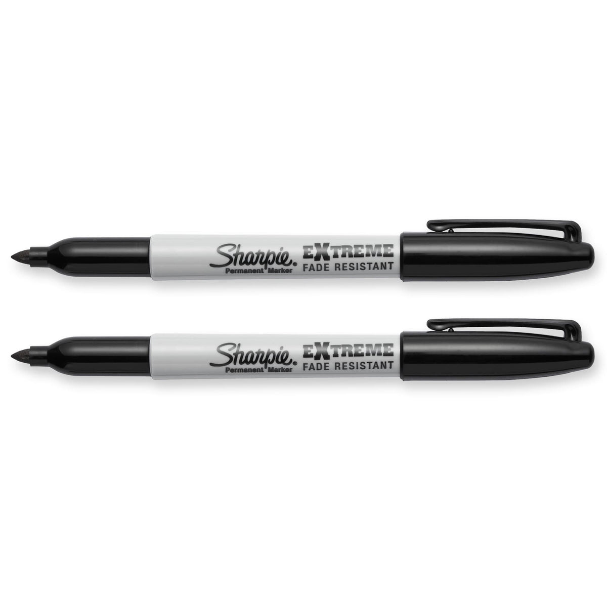 Two black Sharpie Extreme markers uncapped with caps posted, lying horizontally on a white background.