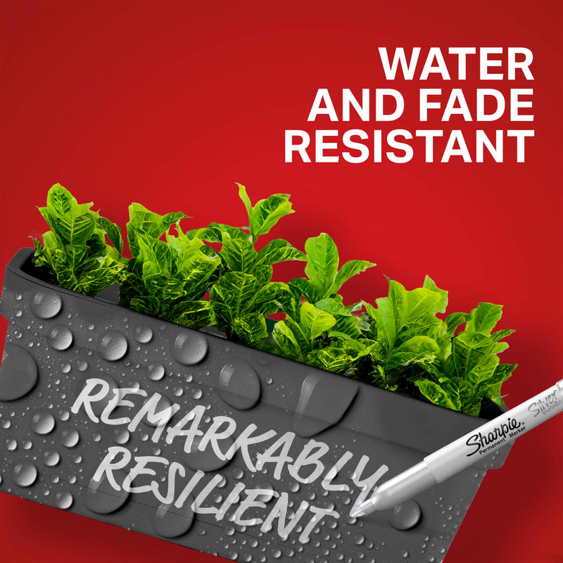 Sharpie feature graphic reading Water and fade resistant, Remarkably resilient, written in silver on a wet dark plant pot.