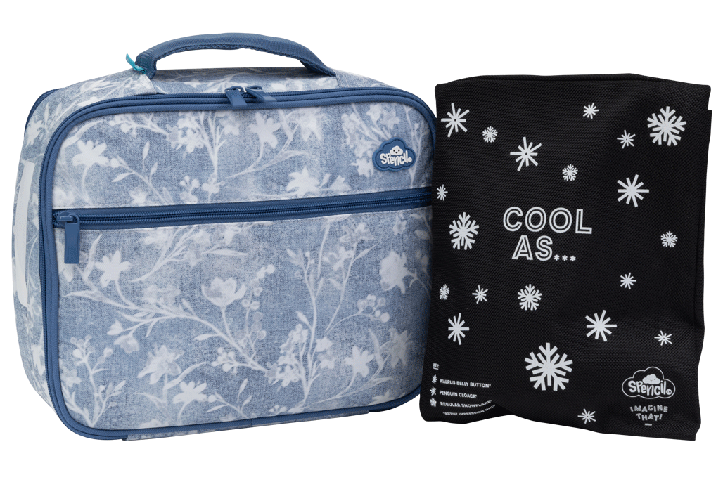 Spencil Denim Daze Big Cooler Lunch Bag standing beside its Big Chill Pack in a black snowflake Cool As cover, showing the faded blue denim-look fabric printed with white botanical flower silhouettes and navy trim