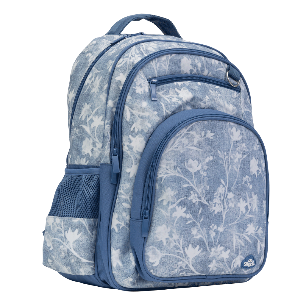 Spencil Denim Daze Big Kids Backpack, front three-quarter view, light denim-blue print with white flowers and navy trim