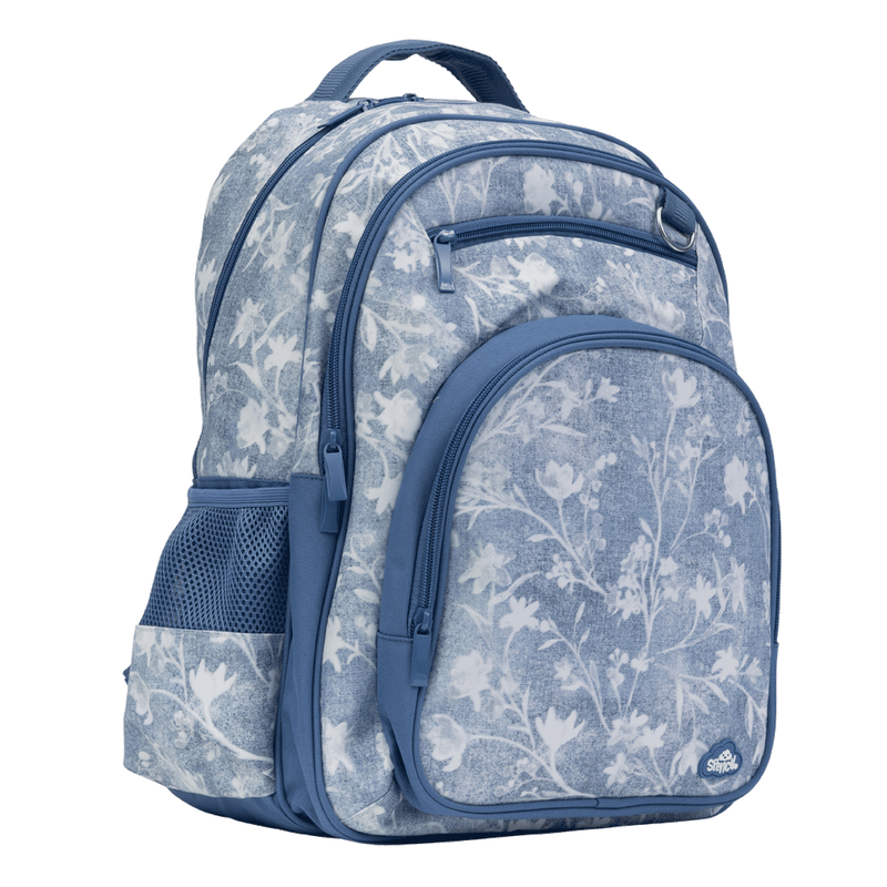 Spencil Denim Daze Big Kids Backpack, front three-quarter view, light denim-blue print with white flowers and navy trim
